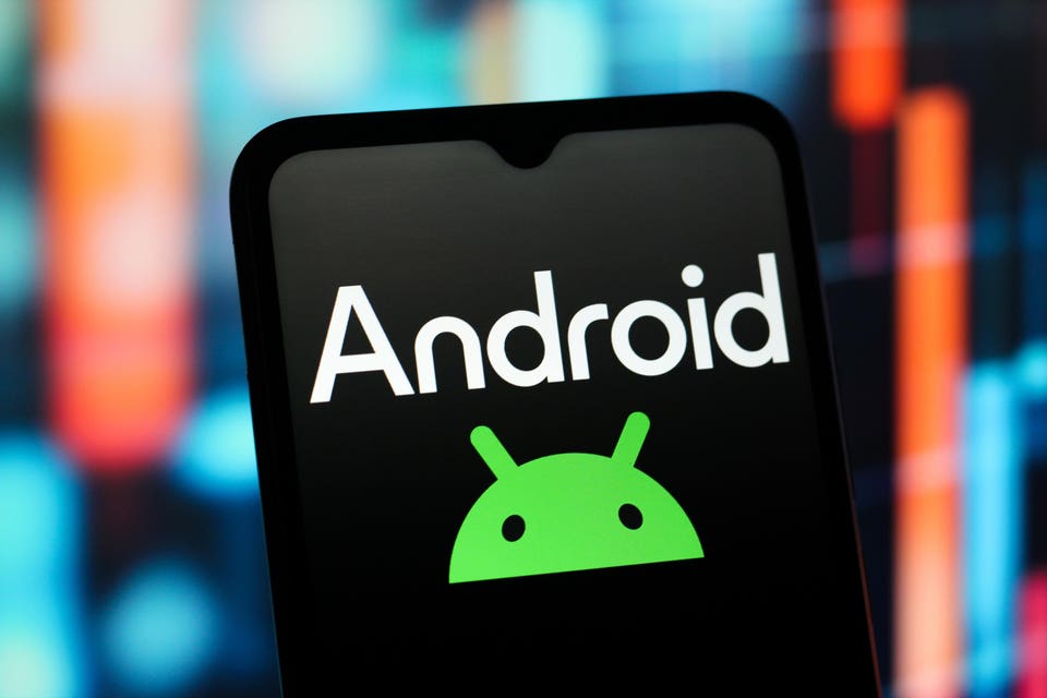 Android logo is seen displayed on a smartphone screen.