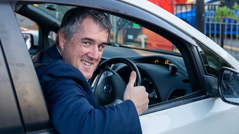 Transport Minister Chris Bishop in his car. 