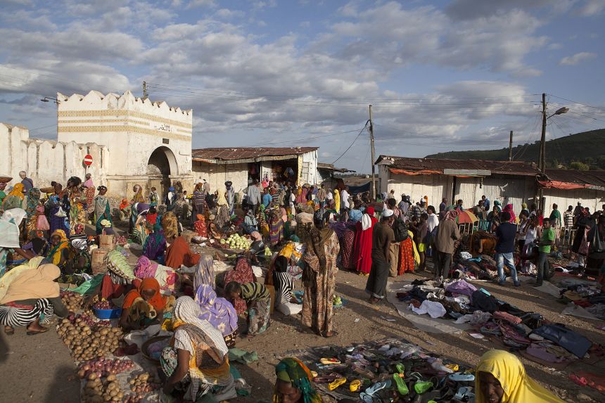A market scene beside one of Harar's five ancient gates. One of Islam's most holy sites, its walled town has long been a crossroads of faiths.