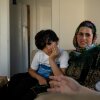 Khadija Rahmani says her son, Mujib Ur Rahman, 12, looks forward to visits from Shabana Siddiqui, a health educator who left Afghanistan in 2022.