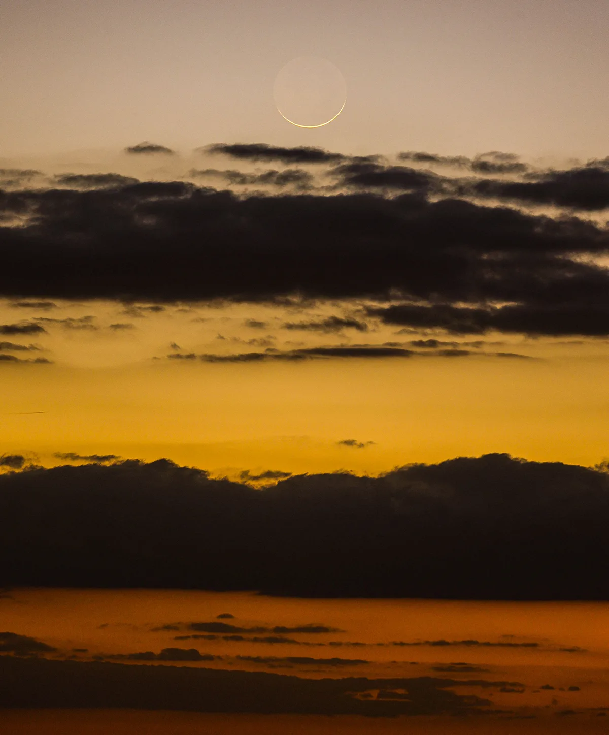 Thanks to Giovanni Passalacqua for sending us this wonderful image of last night's thin crescent Moon from Ragusa, Sicily, Italy, 17 May 2026, 20:50 local time. Equipment: Canon EOS R DSLR camera, Sigma 600mm lens, Manfrotto tripod. Exposure: ISO 320 f/5.6, 0.8s Software: Photoshop