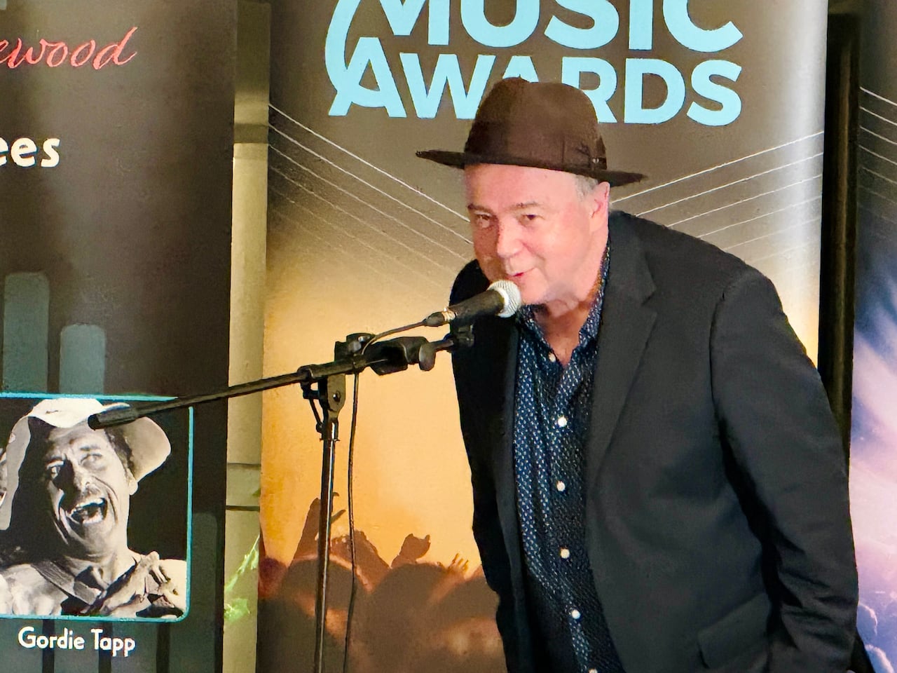 Blues guitarist Ted "Teddy" Leonard speaks at a special event announcing his induction into the London Music Hall of Fame at Anderson Ales on Wednesday.