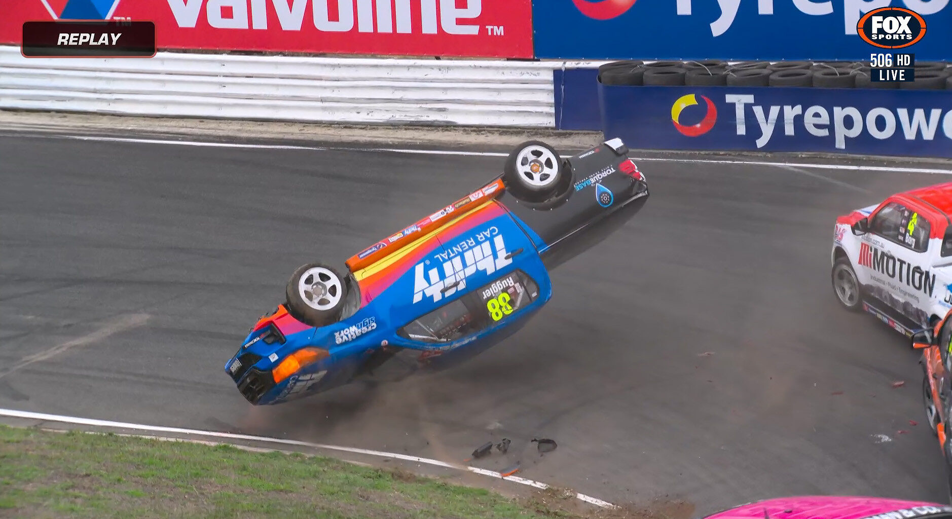 Toyota HiLux rolls at Symmons Plains in bizarre V8 SuperUtes crash