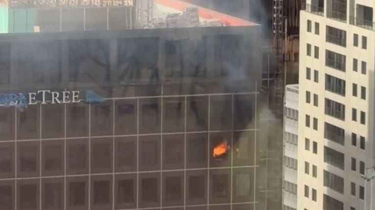 Flames from the 19th floor of the DoubleTree by Hilton on Albert St.