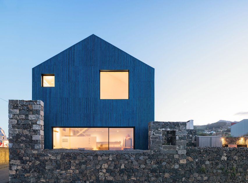 The Blue House Atelier Backlar lit up at night