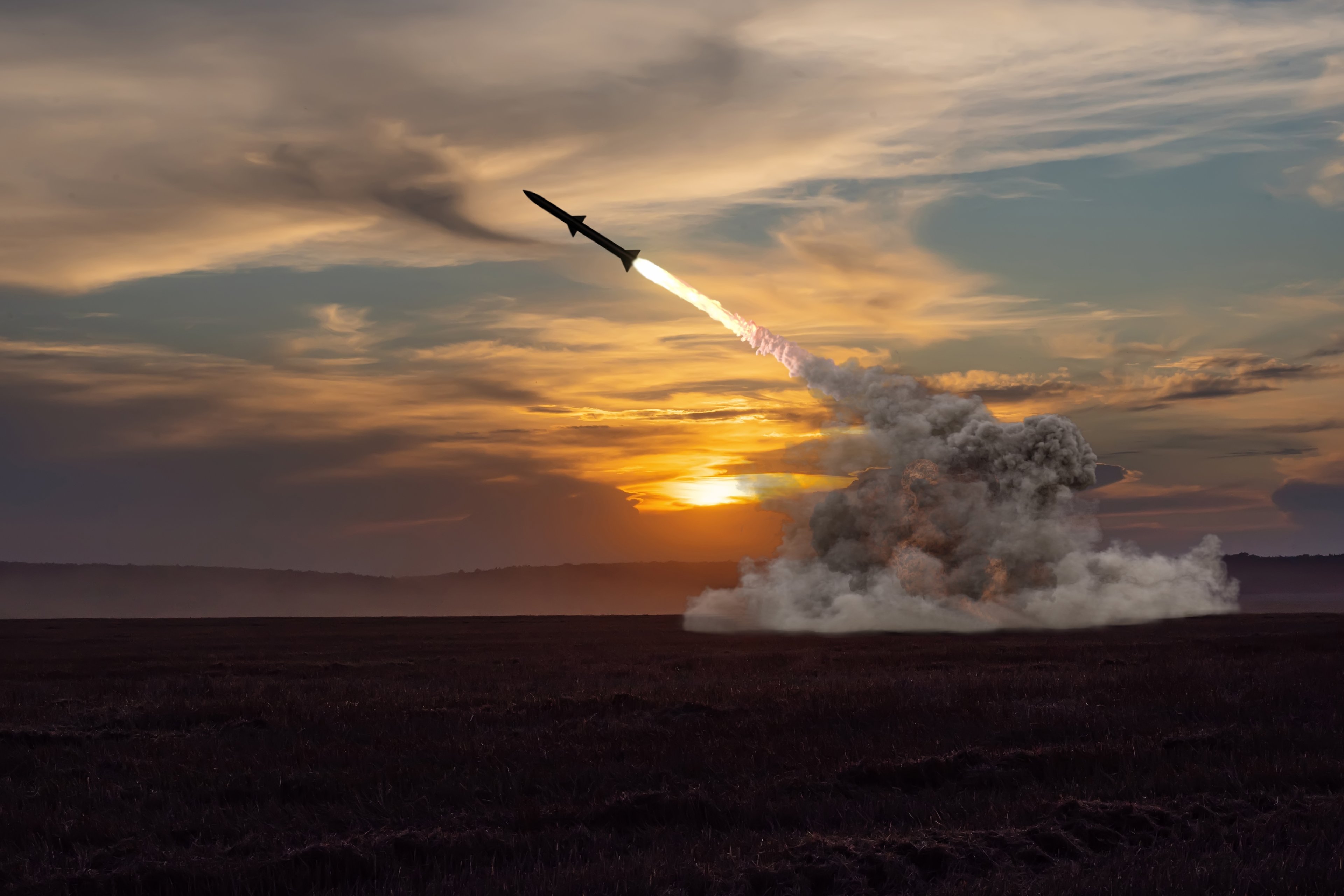 Rocket launching at sunset.