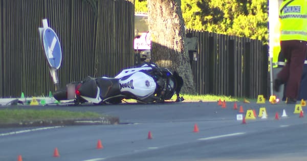 One injured after car flips in crash with motorcycle in Auckland