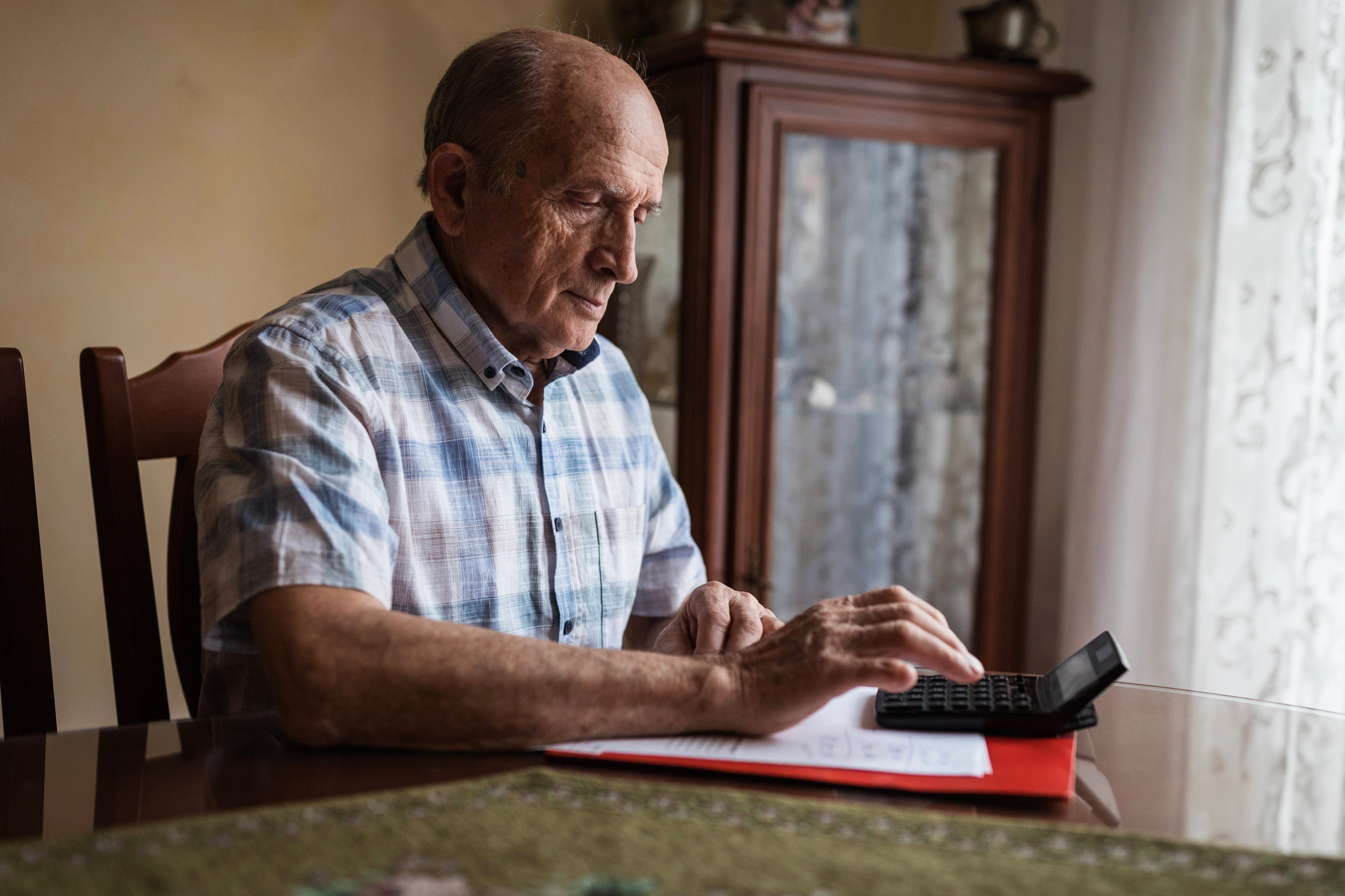 Retiree checking their budget.