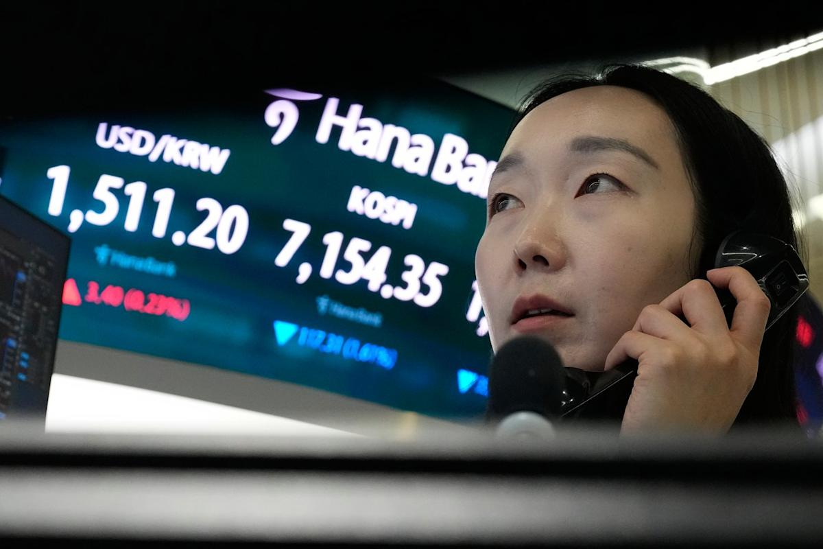 Asian shares surge after oil prices slip and Wall Street resumes its AI rally