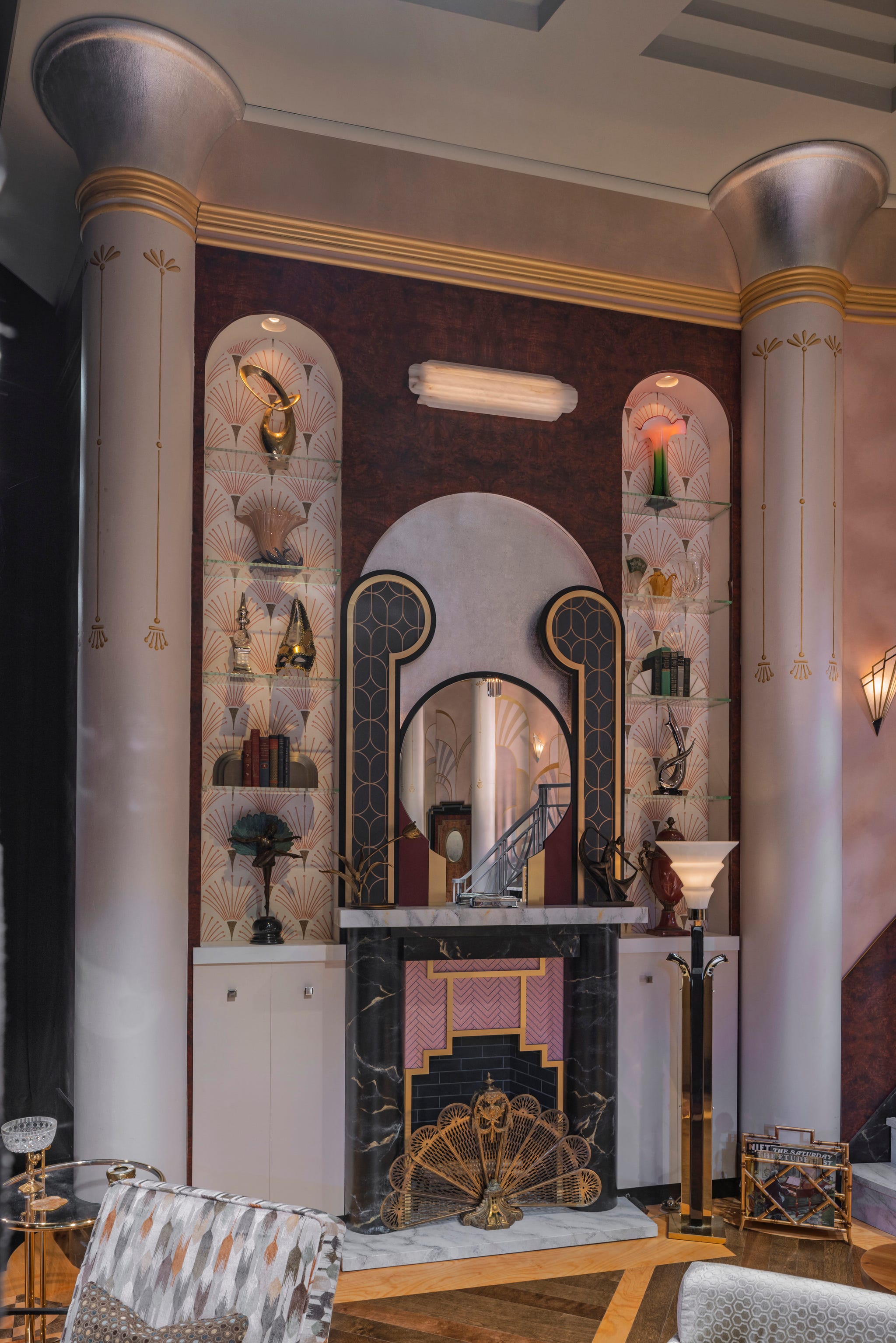Art Deco interior design featuring a fireplace and decorative shelves. Art Deco interior design featuring a fireplace and decorative shelves.
