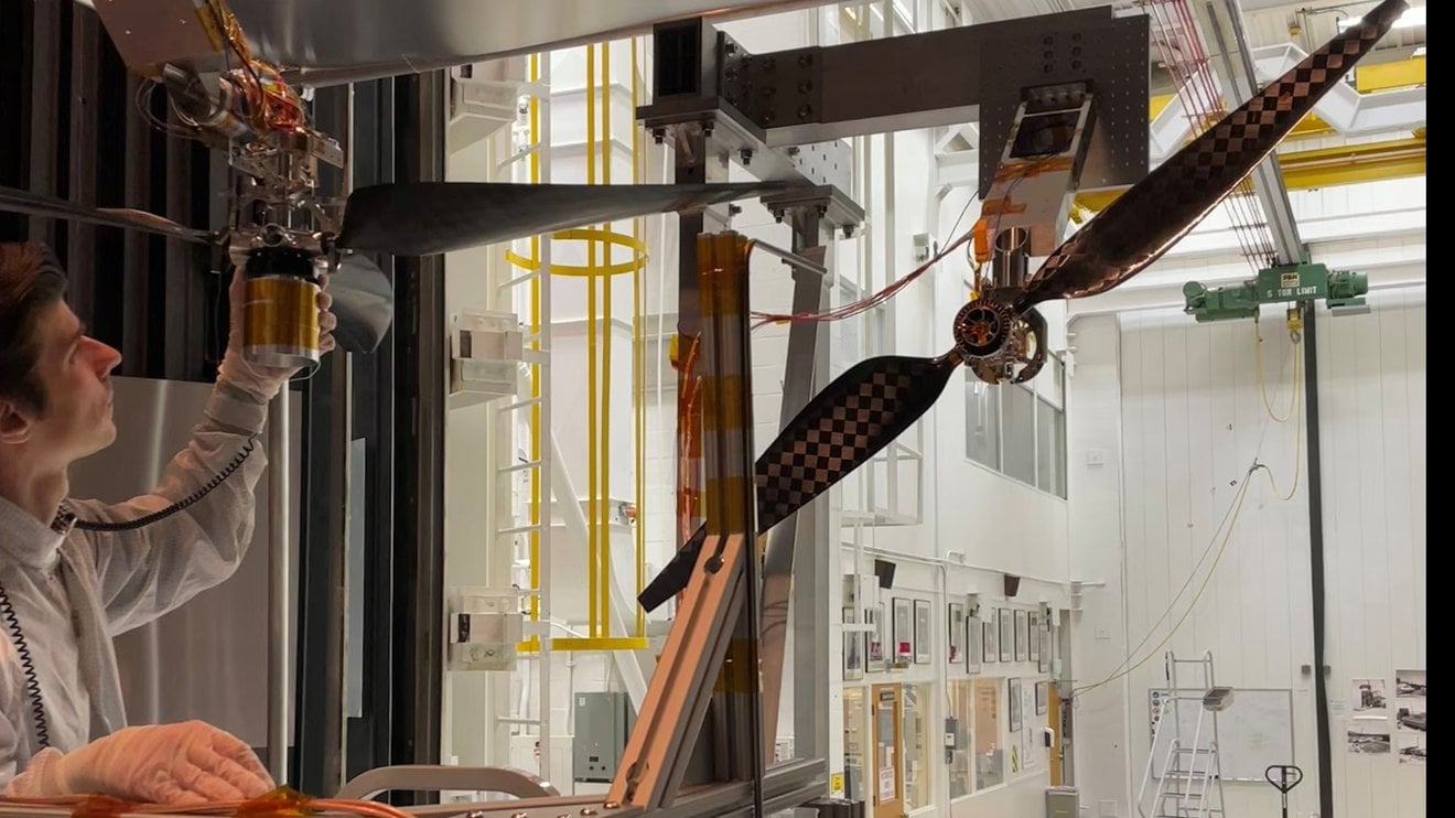 New Martian helicopter blades being tested by engineer Jaakko Karras before being tested. Credit - NASA / JPL-Caltech