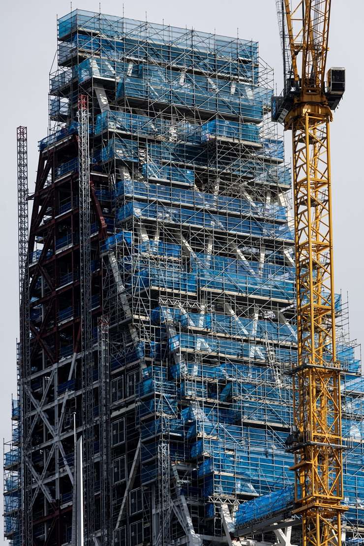 The partially built Seascape apartment tower, left, in Auckland CBD is looking for a new owner. Photo / Michael Craig