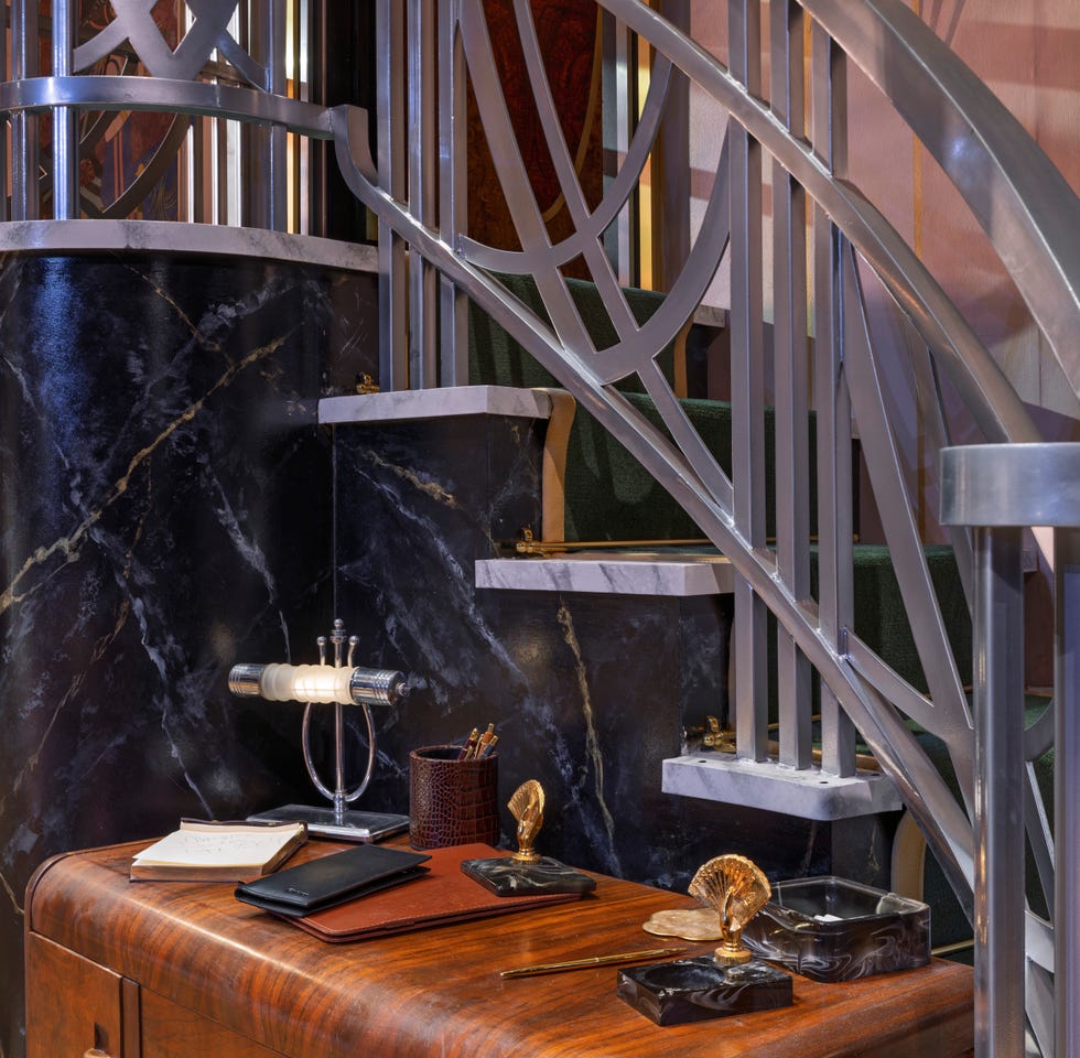Stylish staircase with a modern desk area Stylish staircase with a modern desk area