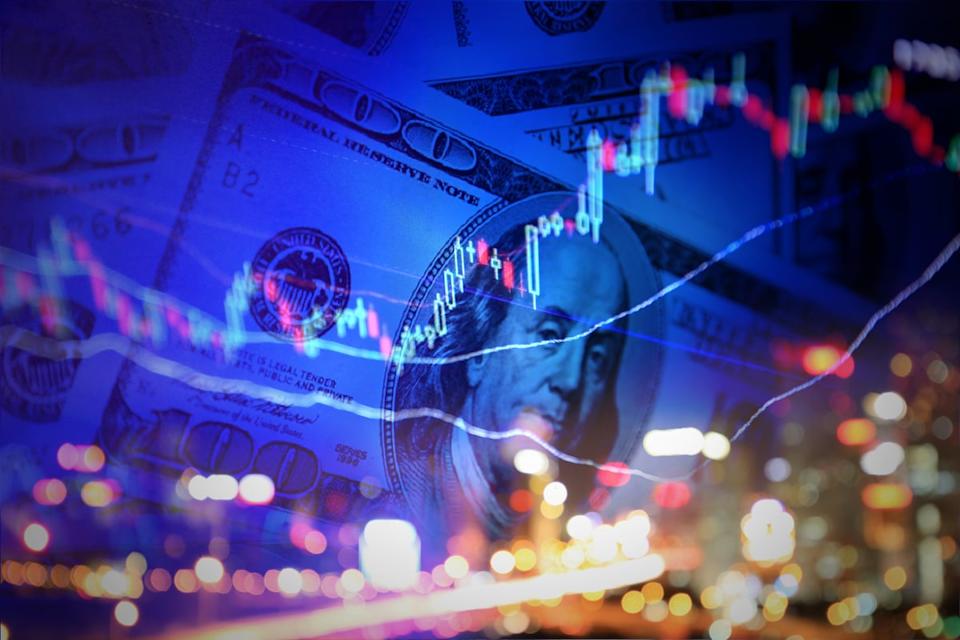 A stock chart with a city skyline and money in the background.