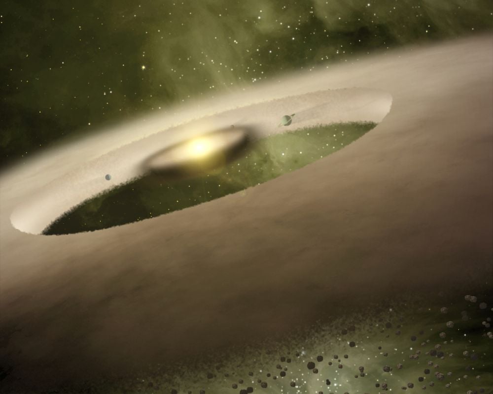 We know stellar flybys occur because we've seen them in other Solar Systems like this one. This illustration shows the dusty circumstellar disk surrounding the young protostar UX Tauri A, which is being perturbed by a passing star. We also know that our Solar System has experienced them, and will experience more in the future. What risk do they pose? Image Credit: NASA/JPL/Caltech