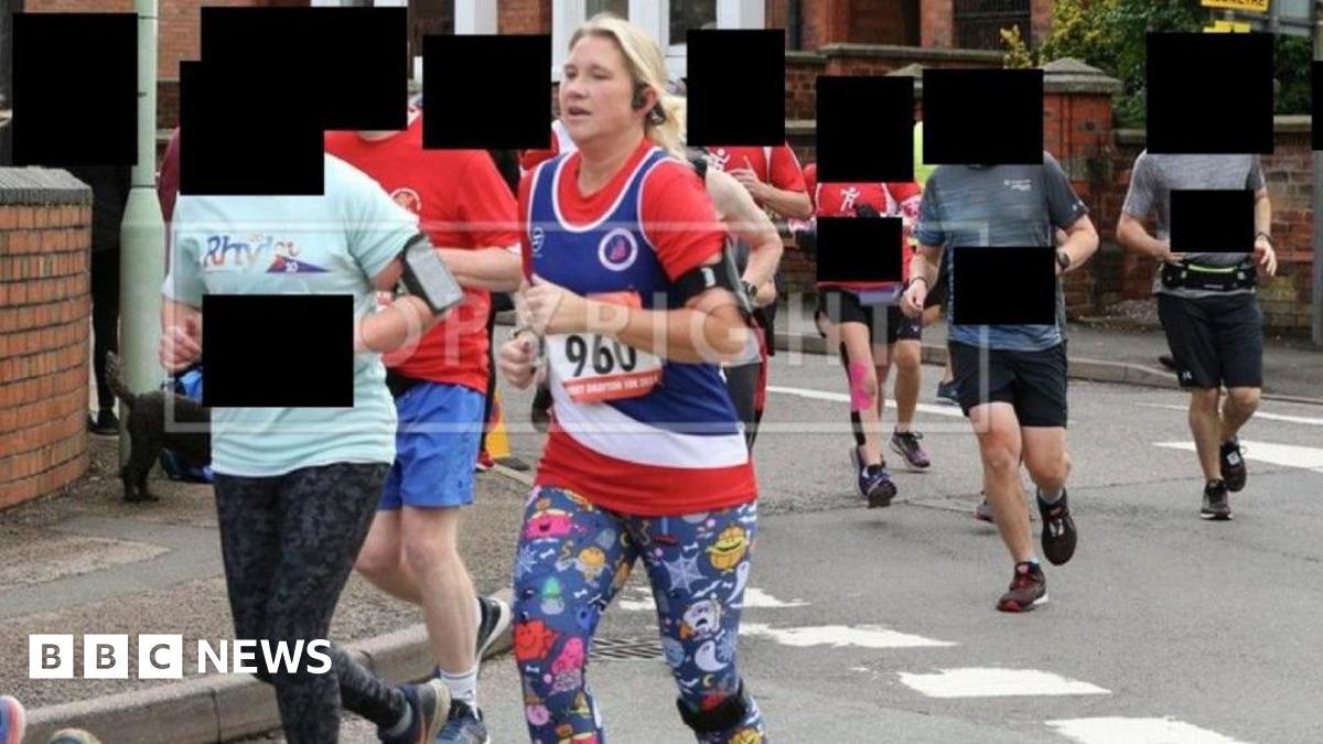 Helen Green is pictured during a race wearing brightly-coloured sports gear and a running number. She is surrounded on a street by other runners, whose identities have been concealed.