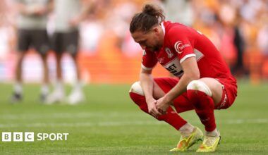 Luke Ayling alone in his thoughts and staring at the floor after Middlesbrough's play-off final defeat to Hull