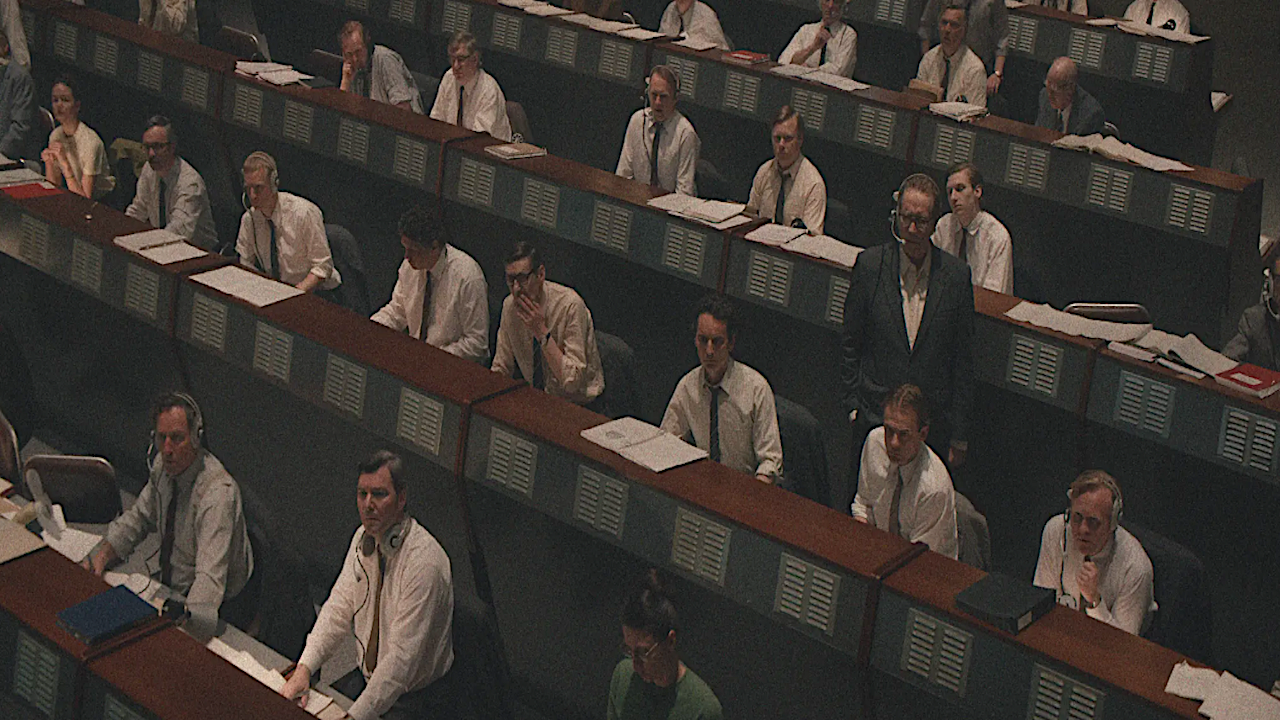 a vintage space program command center filled with people