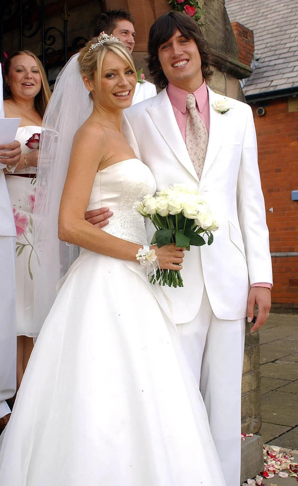 Tess Daly and Vernon Kay leaving St Mary’s Church in Horwich, Bolton, on their wedding day (PA) (PA Archive)