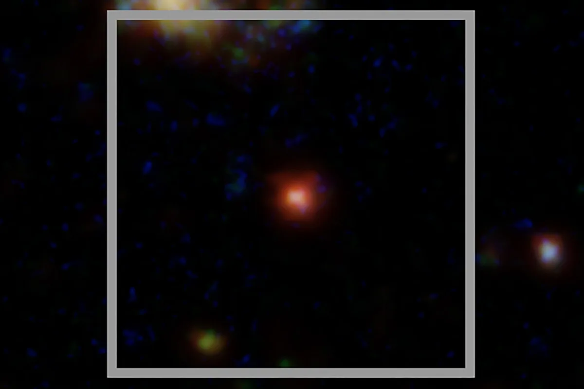 Close-up image of the X-ray dot in X-ray and optical light. X-ray: NASA/CXC/Max Plank Inst./R. Hviding et al.; Optical/IR; NASA/ESA/STScI/HST; Image Processing: NASA/CXC/SAO/N. Wolk