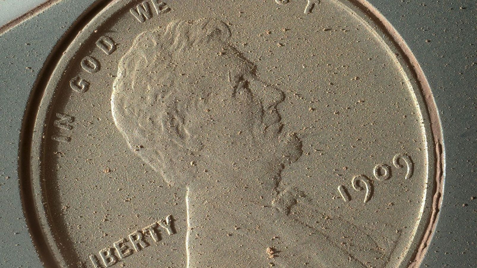 Why does NASA's Curiosity rover have a 'lucky penny' on Mars?