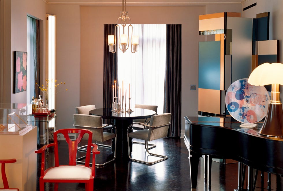 Modern dining area with musical elements and artistic decor.