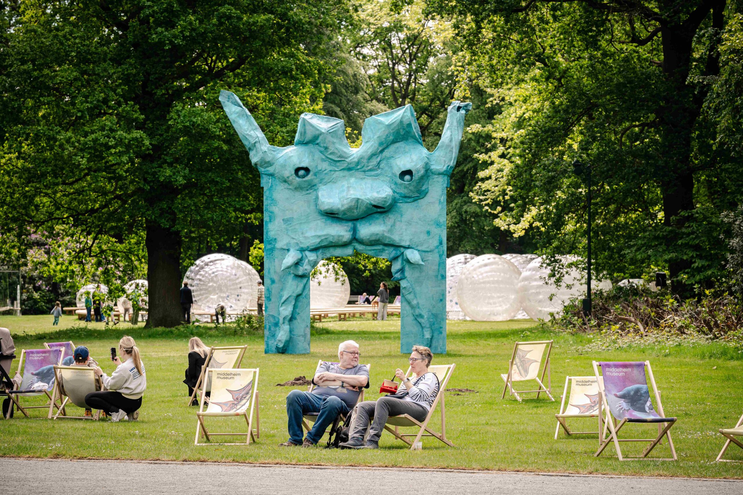 monster chetwynd’s pink salamanders create a playful portal to another world in antwerp - 5