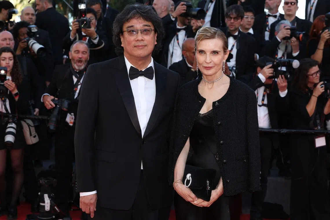 South korean director Bong Joon-Ho and Marrakech festival director Melita Toscan Du Plantier at the Cannes Film Festival in  France.