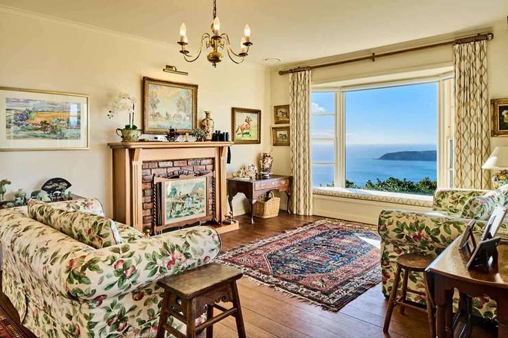 A 742ha coastal farm in Porirua with four dwellings and its own private beach has sold for an undisclosed price. Photo / Supplied
