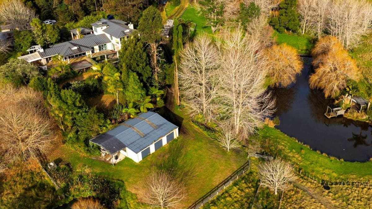 Auckland mansion with private lake now on sale in mortgagee auction had ties to bankrupt developer