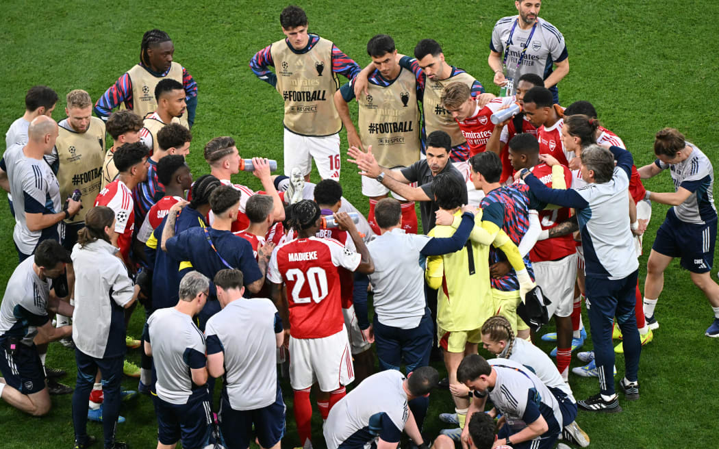Arsenal's Spanish manager Mikel Arteta gives instructions to his players ahead of extra time during the UEFA Champions League final football match between Paris Saint-Germain (PSG) and Arsenal FC at the Puskas Arena in Budapest on May 30, 2026. (Photo by Attila KISBENEDEK / AFP)