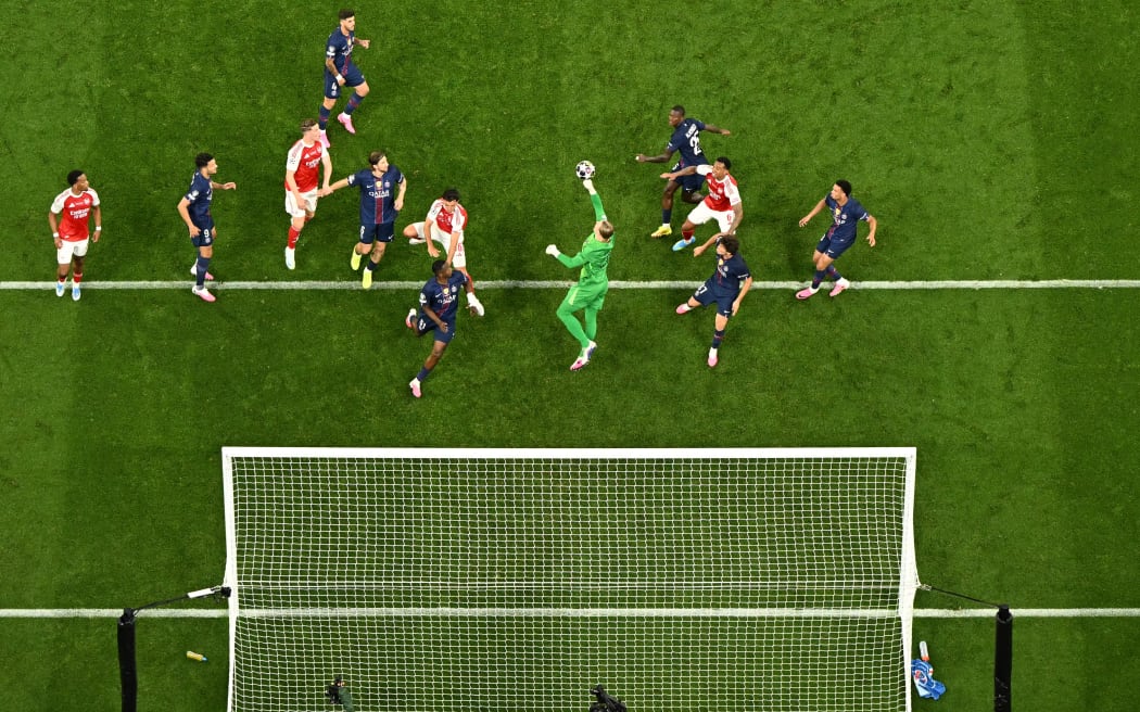 Paris Saint-Germain's Russian goalkeeper #39 Matvey Safonov clears the ball during the UEFA Champions League final football match between Paris Saint-Germain (PSG) and Arsenal FC at the Puskas Arena in Budapest on May 30, 2026. (Photo by Nicolas TUCAT / AFP)
