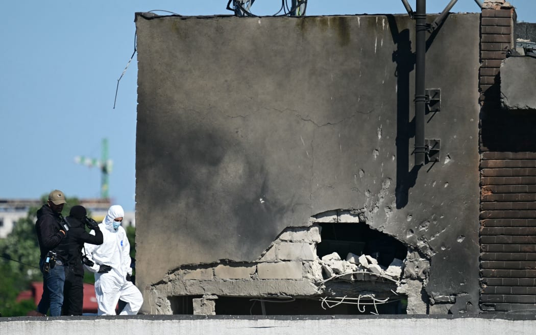 Police and forensic investigators examine the location of impact after a Russian drone struck an apartment building in Galati, eastern Romania. A Russian drone wounded two people as it struck an apartment building in NATO-member Romania, its defence ministry said on May 29, 2026, the latest spillover from the four-year war into neighbouring states.