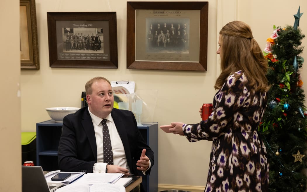 New Zealand Herald Wellington business editor Jenée Tibshraeny records a few budget 2026 thoughts from economist Brad Olsen in the Press Gallery kitchen. With lots of extra bodies on precinct for Budget Day, people grab space where they can.