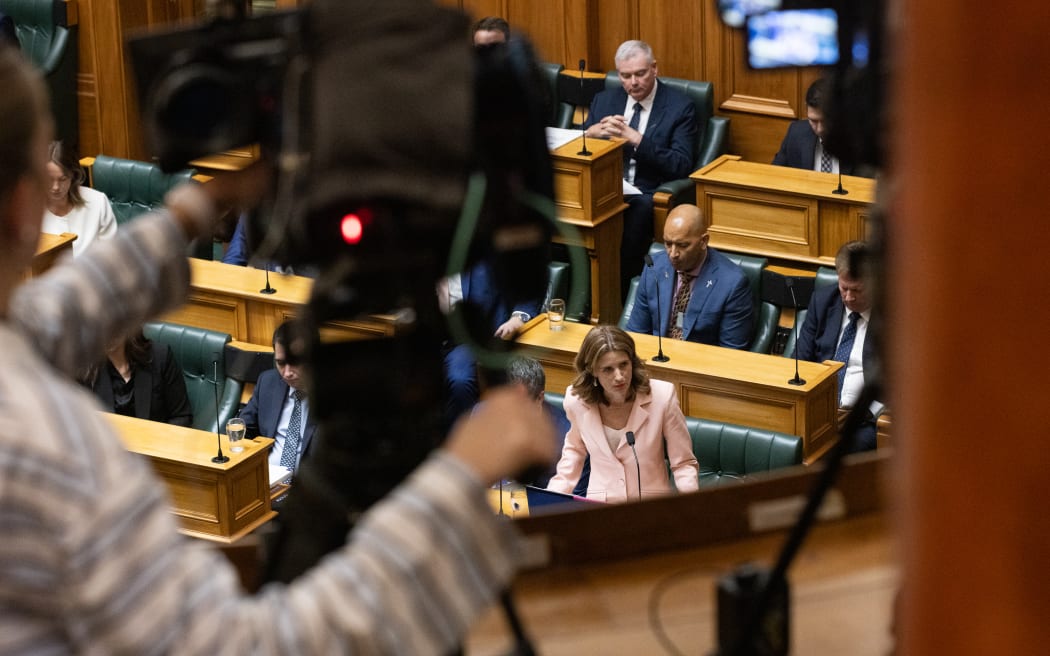 Under the watchful eye of multiple cameras, Nicola Willis delivers Budget Speech 2026.