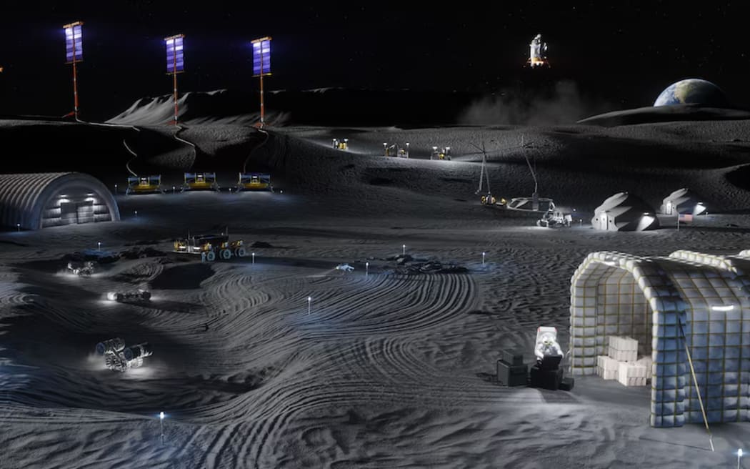 An artist's rendering showing astronauts, habitats, rovers, power systems and cargo operations at the proposed Moon base.