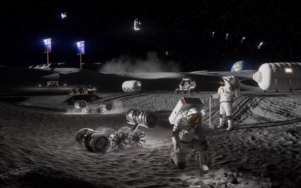 An artist's rendering showing astronauts, habitats, rovers, power systems and cargo operations at the proposed Moon base.