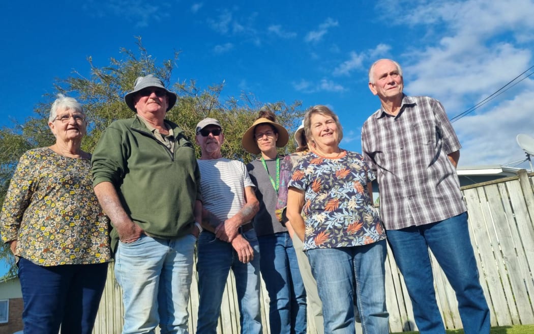 Neil and Judith Herdon believe a 15m high cellphone tower proposed to be built in the road reserve outside their Spotswood property will take thousands of dollars off its value.