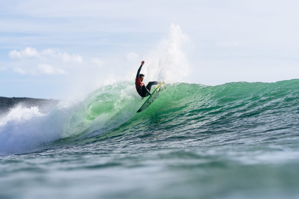 World Surf League champion Yago Dora surfs a perfect 10 in a quarterfinal heat of the New Zealand Pro at Raglan. (Photo by Rambo Estrada/World Surf League)