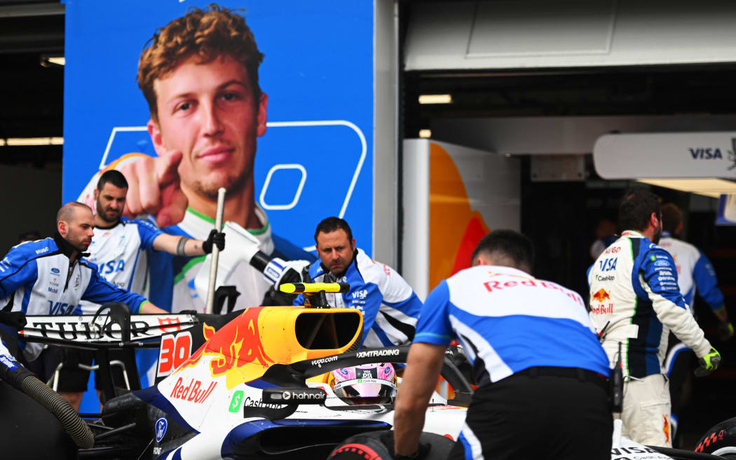 The Racing Bulls team work on Liam Lawson's car in the pitlane during qualifying for the Canadian Grand Prix, in Montreal, Quebec, 23 May 2026. (Photo by Rudy Carezzevoli / GETTY IMAGES NORTH AMERICA / Getty Images via AFP)