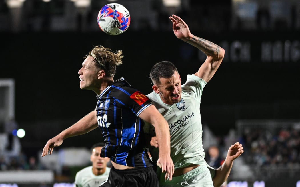 Sam Cosgrove of Auckland FC and Jordan Courtney-Perkins of Sydney FC,