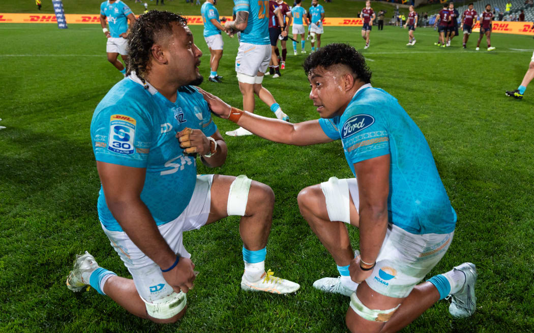 Moana Pasifika captain Miracle Faiilagi with Semisi Tupou Ta'eiloa after their loss to the Reds - Super Rugby Pacific - Round 15 match between Moana Pasifika v Reds held at North Harbour Stadium, Auckland - New Zealand - on Saturday 23 May 2026.
Photo credit: Brett Phibbs / www.photosport.nz