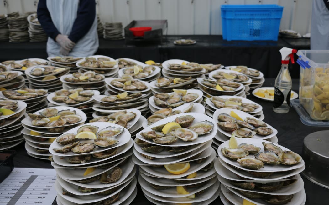 Plates piled high with Bluff oysters, known indigenously as tio, and abroad as Chilean oysters.