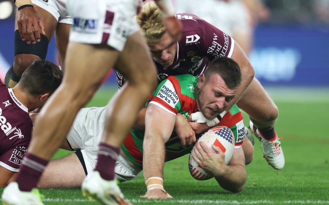 Jai Arrow is tackled while playing for the Rabbitohs in 2024.