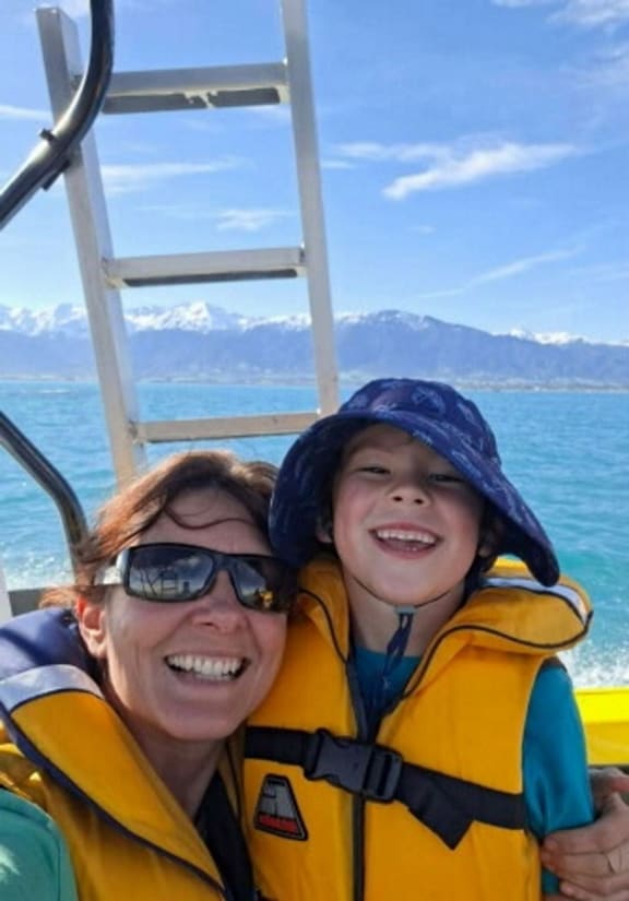 Dr Jody Weir and her son Elliot enjoy being out on the water with Seal Swim Kaikōura.