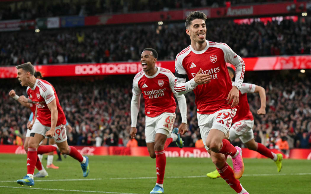 Arsenal's German midfielder #29 Kai Havertz celebrates scoring the opening goal during the English Premier League football match between Arsenal and Burnley at the Emirates Stadium in London on May 18, 2026. (Photo by Glyn KIRK / AFP) / RESTRICTED TO EDITORIAL USE. No use with unauthorized audio, video, data, fixture lists, club/league logos or 'live' services. Online in-match use limited to 120 images. An additional 40 images may be used in extra time. No video emulation. Social media in-match use limited to 120 images. An additional 40 images may be used in extra time. No use in betting publications, games or single club/league/player publications. /
