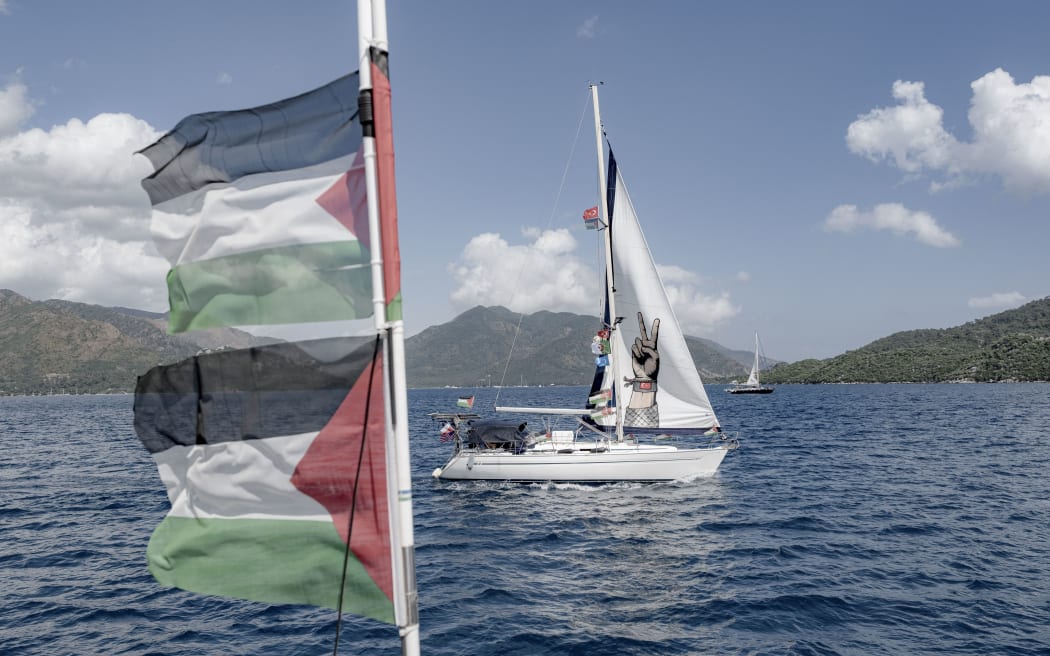 Boats decorated with Palestinian flags and solidarity messages depart from the port in Marmaris, Turkey, on May 14, 2026. The