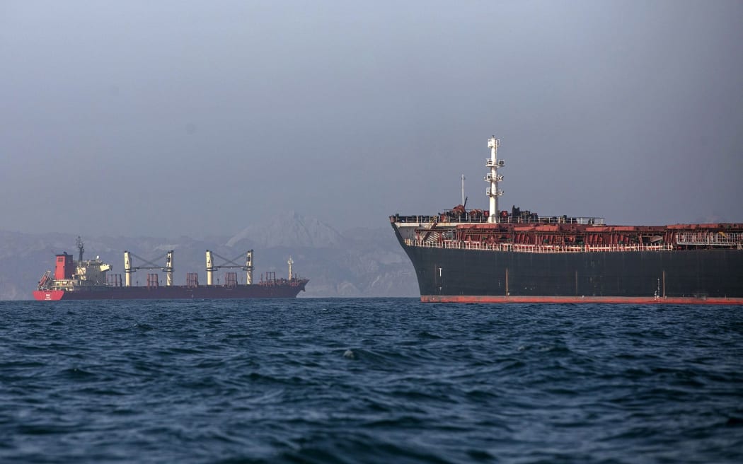 Ships remain anchored on 16 May, 2026, in the Strait of Hormuz near Larak Island, Iran. Negotiations between the US and Iran over opening this critical waterway have largely stalled as the countries have rejected each other's proposals to end the war that began when the US and Israel attacked Iran on 28 February.