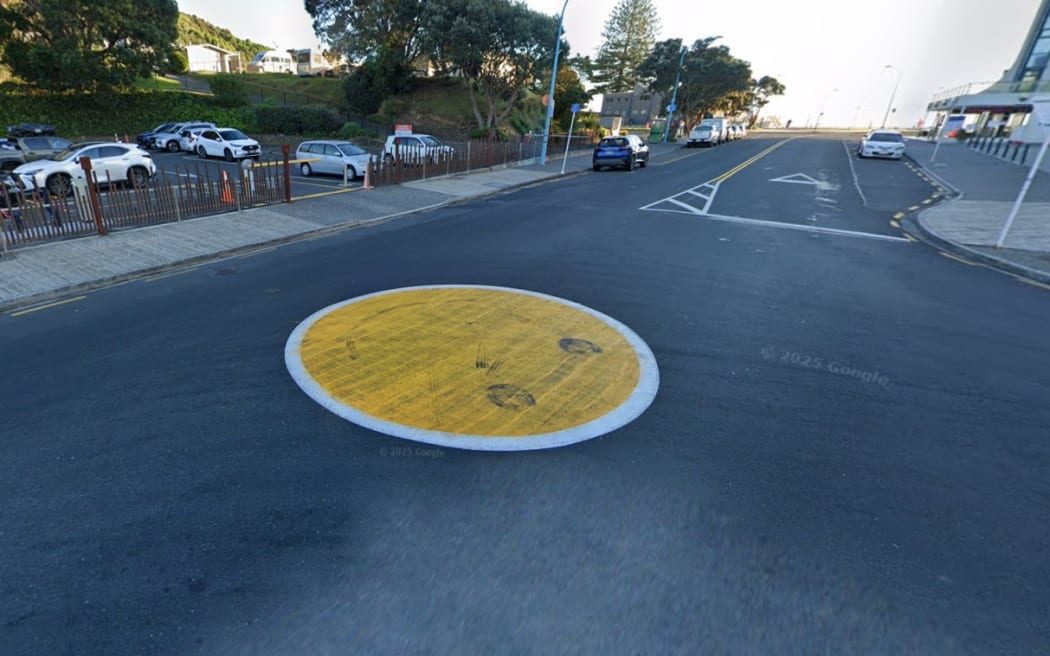 The smiley face roundabout in front of the Mount Maunganui Hot Pools.