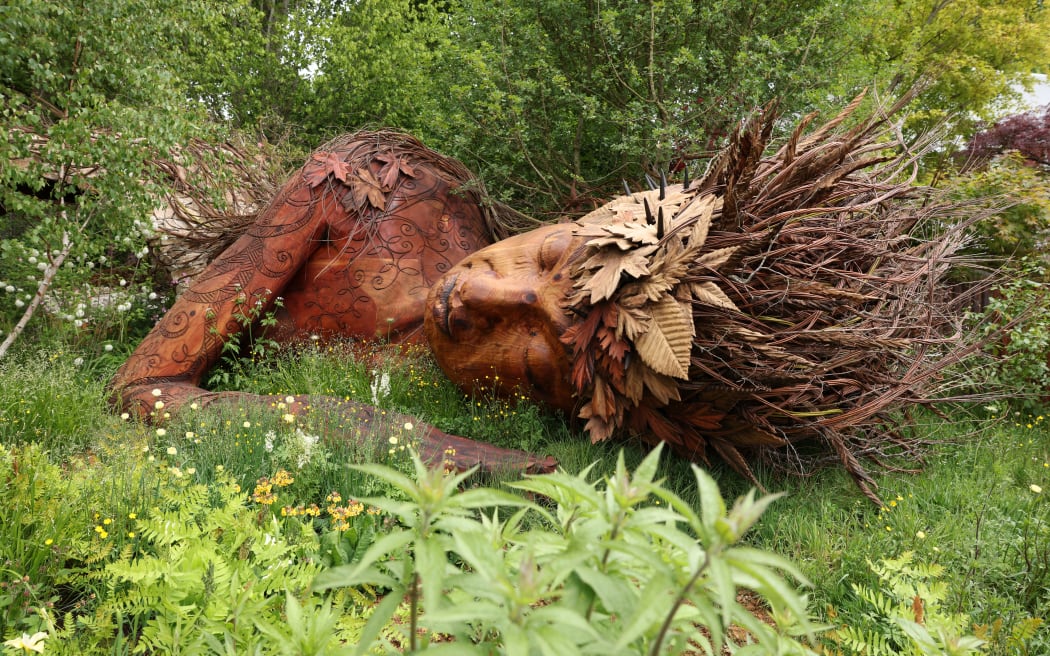 A sculpture is pictured in The Campaign to Protect Rural England's 'On the Edge garden, designed by Sarah Eberle, on the press day ahead of the 2026 RHS Chelsea Flower Show in London on May 18, 2026. (Photo by Adrian DENNIS / POOL / AFP)